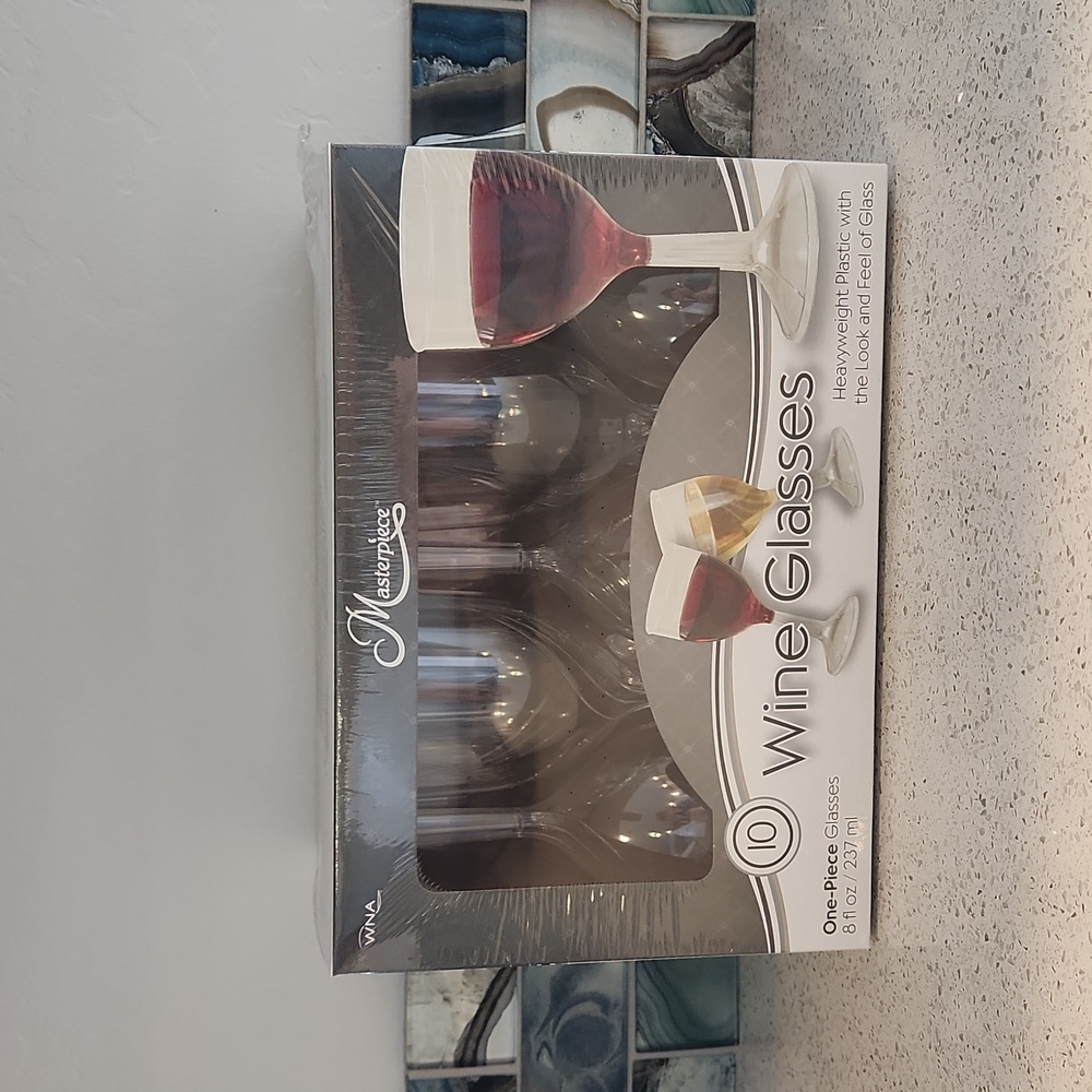 10 Wine Glasses Looks like Glass 8oz Each